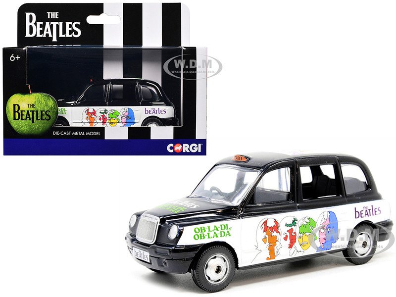 The Beatles London Taxi RHD (Right Hand Drive) "Ob-La-Di, Ob-La-Da" Black and White with Graphics Diecast Model Car by Corgi